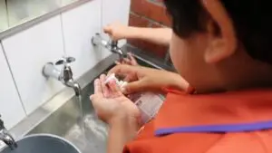 Child washing hands