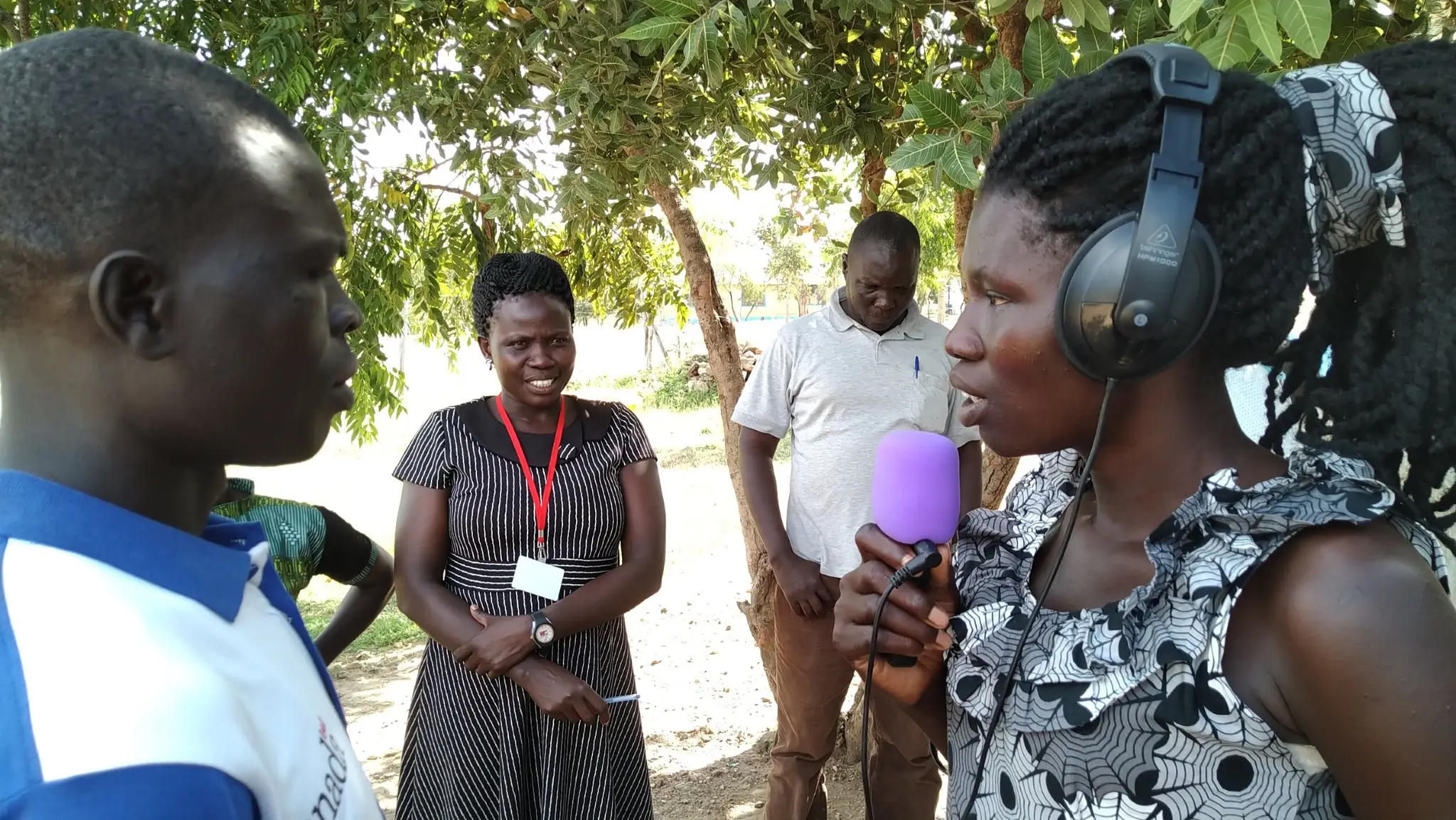 Woman interviewing a man