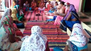 Women in a community meeting