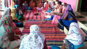 Women in a community meeting