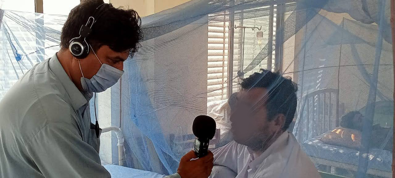 Man interviewing a hospital patient