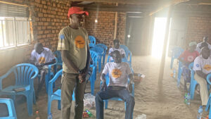 Man standing before group