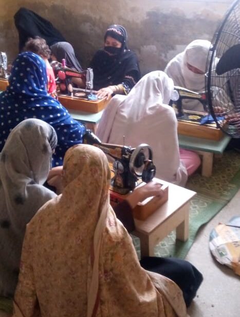 Women in sewing class