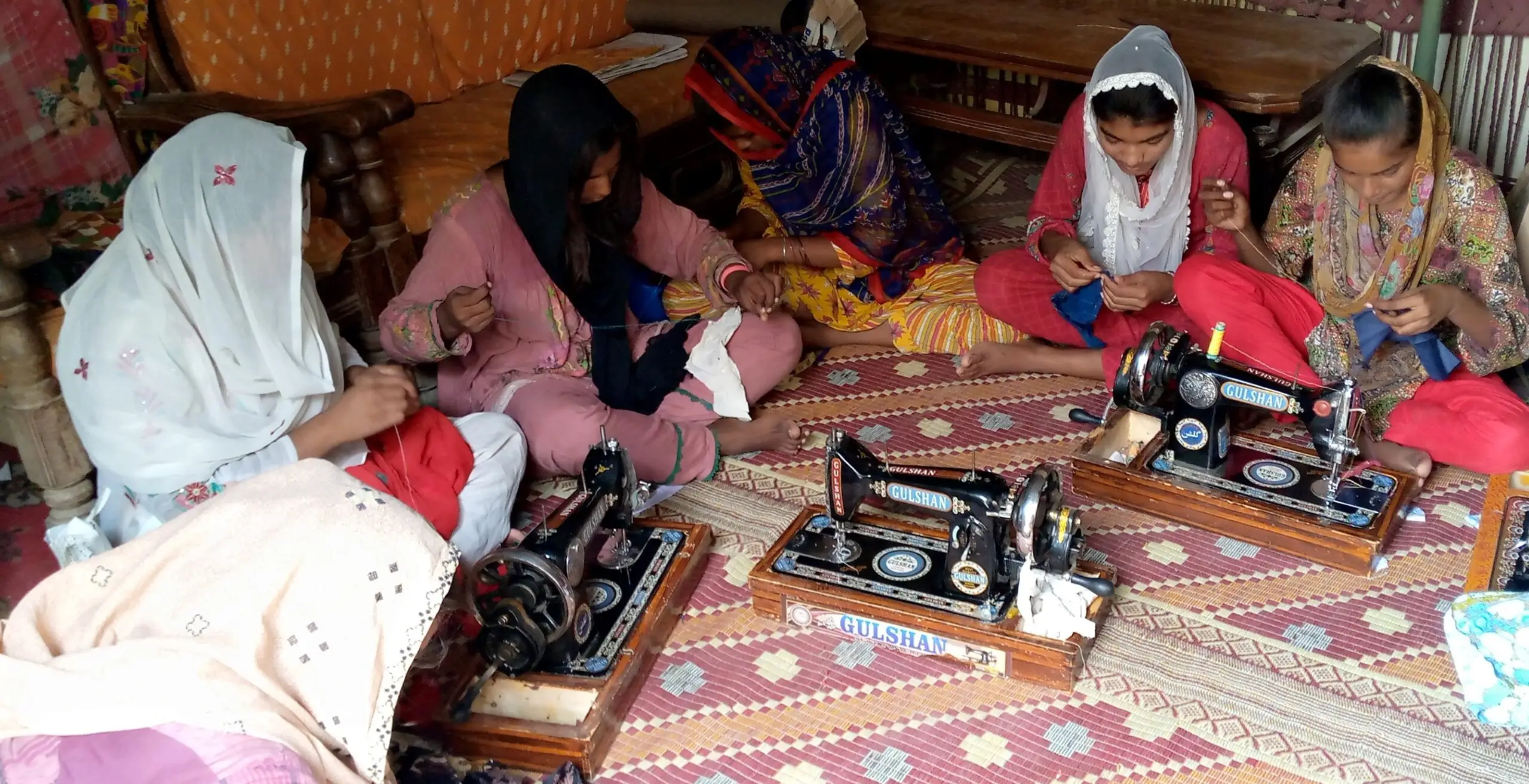 Women learning to sew