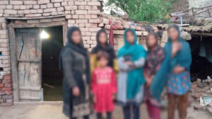 Six sisters in front of their home