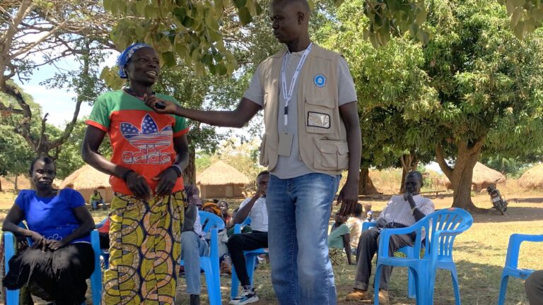 Woman speaking into microphone