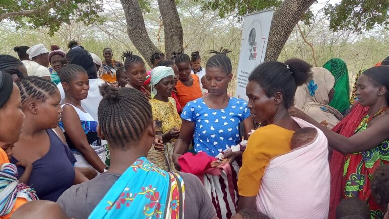 Women engaging with Vox Radio team