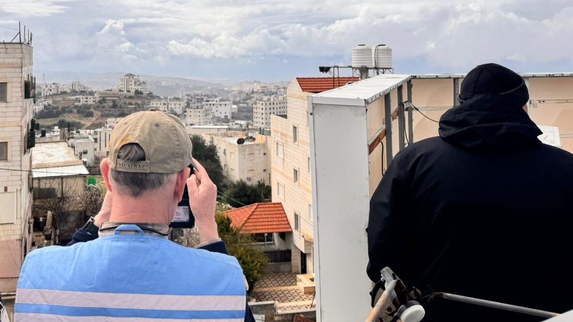 Two men on a rooftop