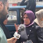 Man and woman talk about Gaza transportation